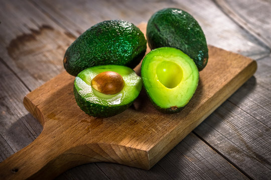 Avocado on  wooden background