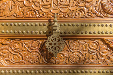 Bronze door caller of the entrance to the Palace of the Counts of Cervellon arabic pattern Anna Valencia Spain