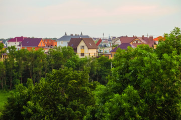 Suburban skyline. Buildings individual suburban housing in the eco-friendly district.