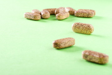 Fototapeta na wymiar natural vitamin tablets on a table