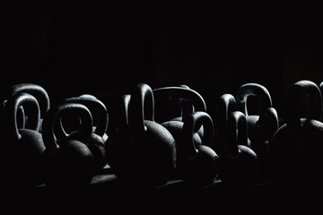Silhouette Dumbbell for weight training in gym. Black kettlebells.