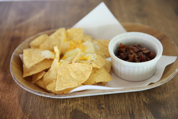 Cheese nachos with tomato sauce