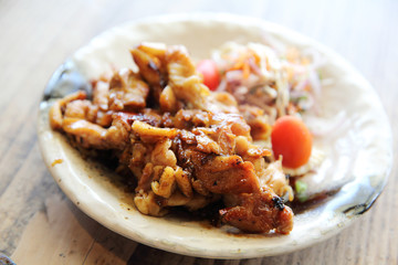 Grilled Chicken teriyaki on wood background