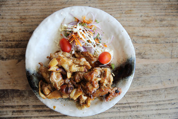 Grilled Chicken teriyaki on wood background
