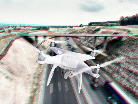Hovering drone taking pictures of highway and bridge, Netherland