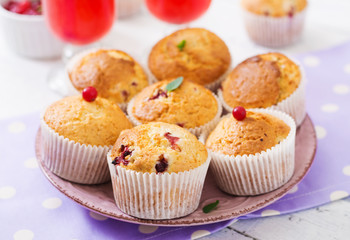 Tasty muffin (cupcake) with cranberries