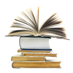 Naklejka premium Stack of old books isolated on a white background