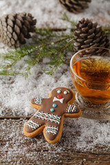 Gingerbread people biscuits with hot drink