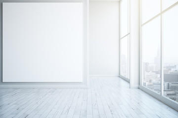 White wooden interior with blank frame