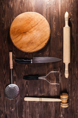 kitchen items set out on the table, wooden table, cooking dinner, cooking dinner
