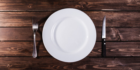 kitchen items set out on the table, wooden table, cooking dinner, cooking dinner