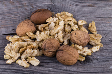 Walnuts on a wooden background