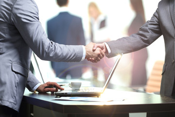 concept - benefits from successful cooperation. the handshake bu