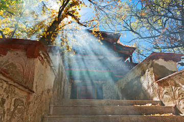 Small Buddhist temple on island in Park in Lhasa. © Belozorova Elena