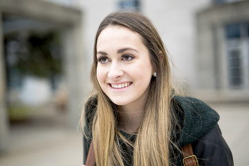 Portrait Of Female University Student Outdoors On Campus