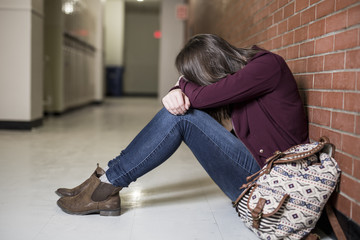 A Young depress female student at the college