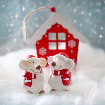 Two cheerful little mouse .Christmas background. Christmas card.
