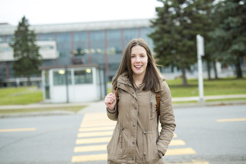Portrait Of Female University Student Outdoors On Campus