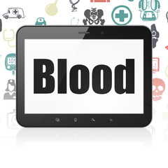 Healthcare concept: Tablet Computer with Blood on display