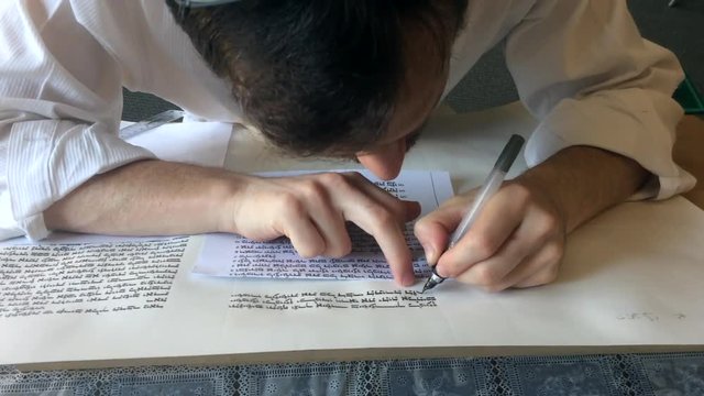 Sofer writes a sefer Torah in Hebrew. In the Torah's 613 commandments, the second to last is that every Jew should write a Sefer Torah in their lifetime.