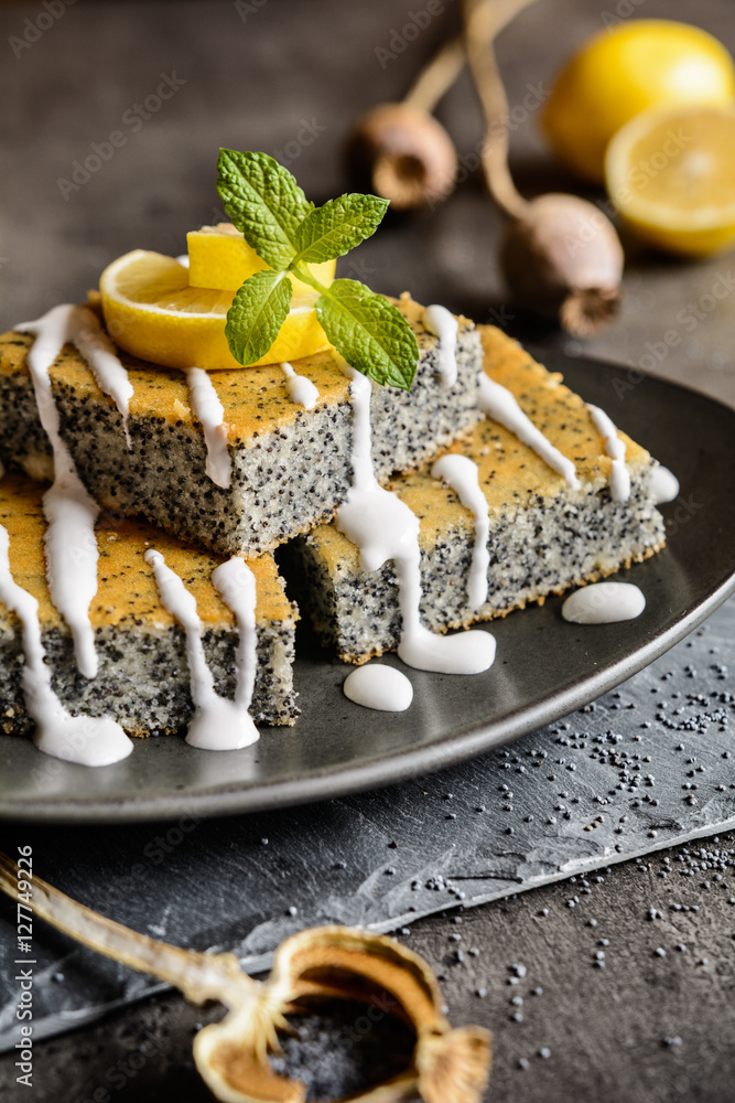 Wall mural Delicious poppy seeds cake topped with lemon glaze - Wall murals