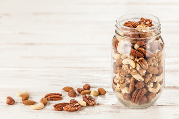 Mix of different nuts closeup photo