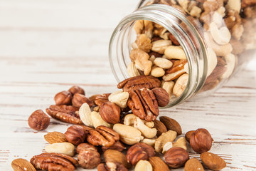 Mix of different nuts closeup photo