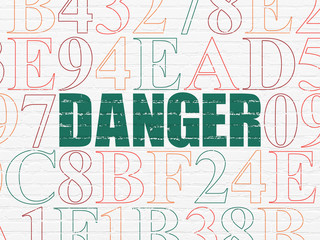 Privacy concept: Danger on wall background