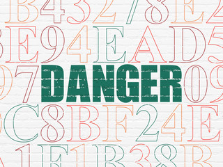 Privacy concept: Danger on wall background