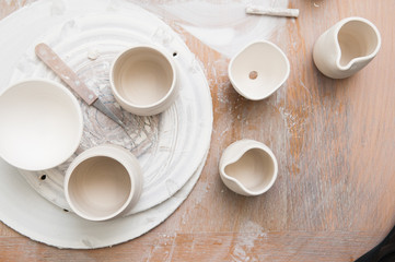 Overhead view of pottery in a ceramics workshop