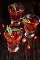 Glasses of fresh cranberry drink.
