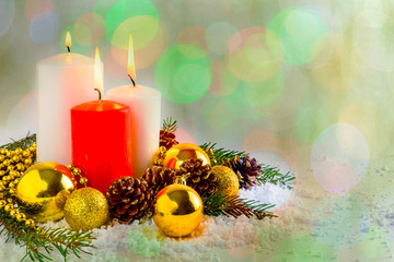 Fototapeta na wymiar Christmas decoration with burning candles on bokeh background