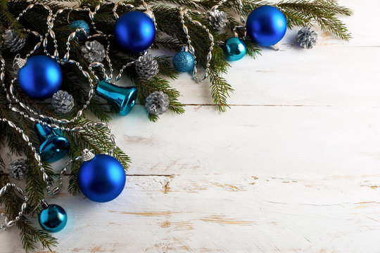 Christmas Background With Silver Pinecone And Blue Ornaments