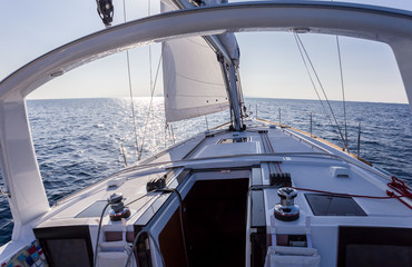 Fototapeta premium sail vessel surfing on the sea