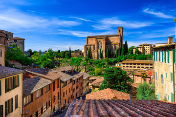 Aerial view of Siena and Basilica of San Domenico (Basilica Cateriniana) is basilica church in Siena, Tuscany, Italy, one of the most important of Siena.