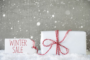 Gift, Cement Background With Snowflakes, Text Winter Sale