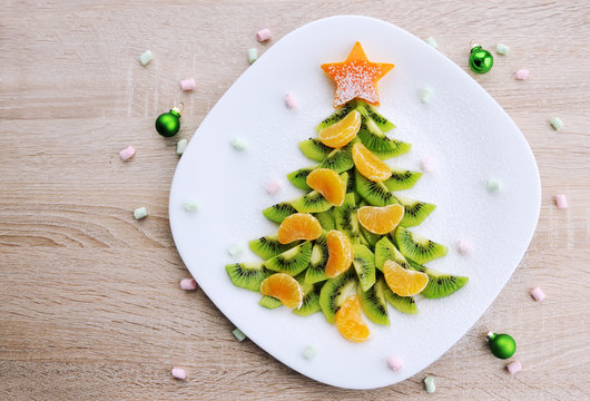 Kiwi Christmas tree - Christmas food background top view blank space for text
