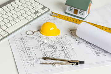 architect tools on white background with drawings apartments top view