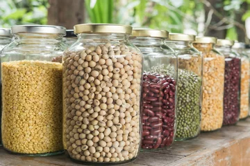  Various dry legumes in a glass jar © peangdao