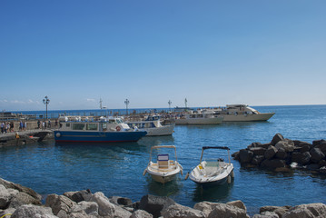 Fototapeta na wymiar Ferries moored to the quay, from Amalfi peninsula