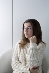 Portrait of adolescent with long chestnut hair