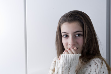 Portrait of adolescent with long chestnut hair