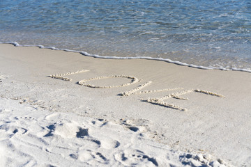 love drawn in the sand