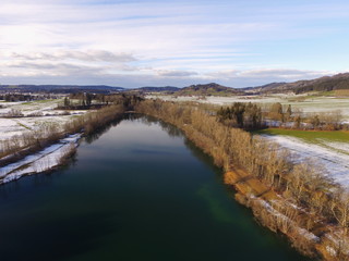 drone shot of lake in winter time