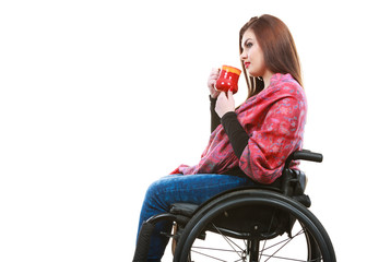 Cheerful crippled lady on wheelchair.