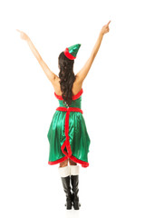 Back view of woman wearing elf clothes pointing up with both hands