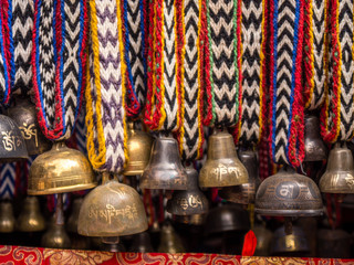 Yak Bells on Colorful Knitted Ribbons