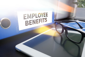EMPLOYEE BENEFITS Man working on tablet TECHNOLOGY COMMUNICATION