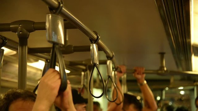Loop grip on the bus to avoid danger.