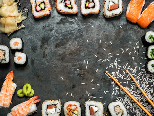 Sushi rolls maki nigiri wasabi  Japanese food background © LiliGraphie